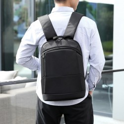 A new ultra-thin and trendy computer bag for men, featuring a fashionable, simple and casual business backpack with cross-border LOGO printing